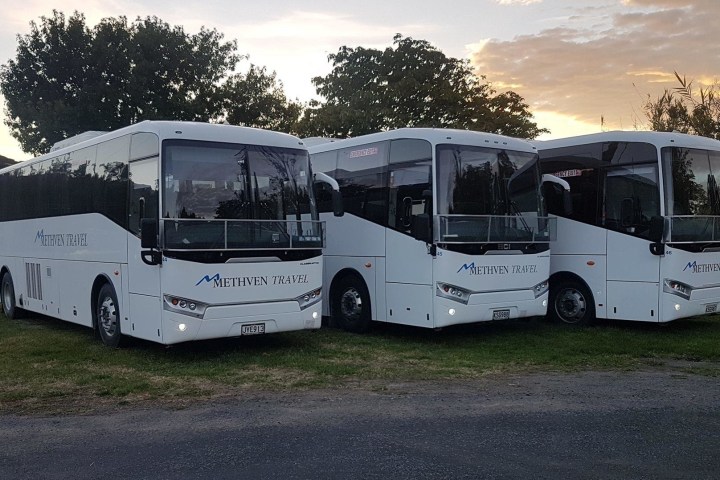 a bus parked on the side of a road