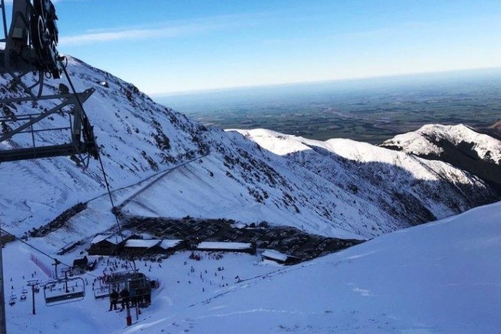 a view of a snow covered mountain