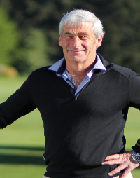 a man holding a frisbee